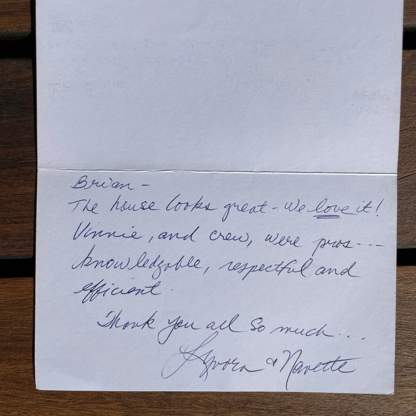 Handwritten note reading “The house looks great, we love it”, praising Vinnie and the crew as knowledgeable and respectful